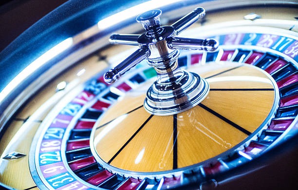Live casino table with multiple players and dealer
